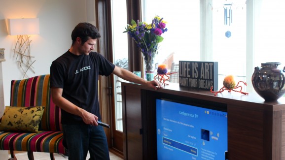 Adam calibrating the living room TV.